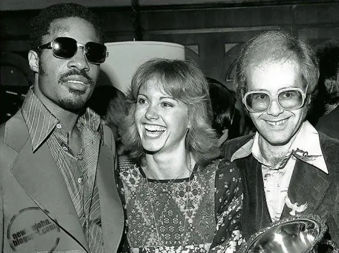 Elton and Stevie (pictured here with Olivia Newton-John in 1975) have been friends for over five decades.