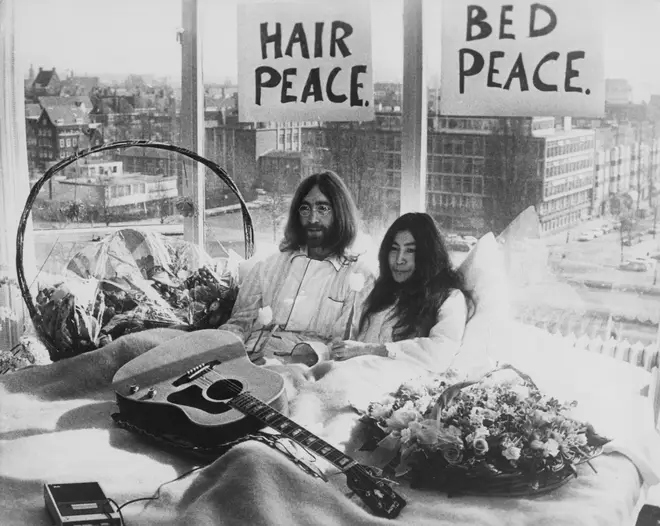 John Lennon and Yoko Ono demonstrating their peace activism
