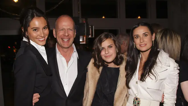 Bruce and Emma (left) with daughter Tallulah and ex-wife Demi