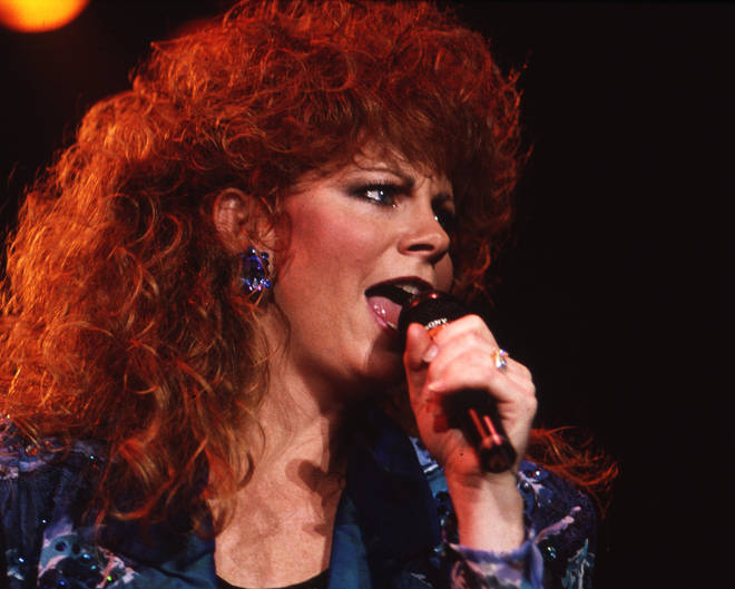 Reba McEntire performs in 1990