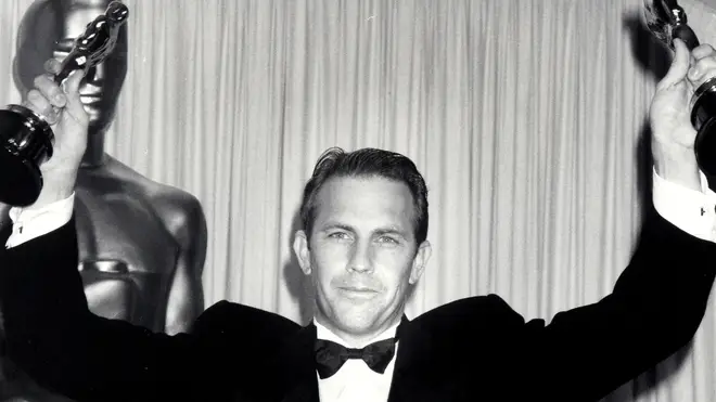 Kevin Costner with his two Oscars