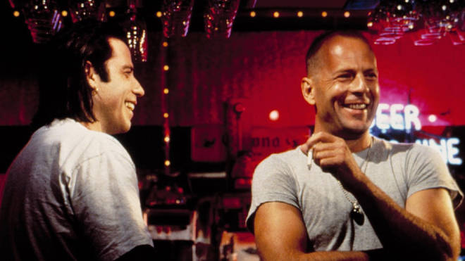 Bruce and John joking together on the set of Pulp Fiction.