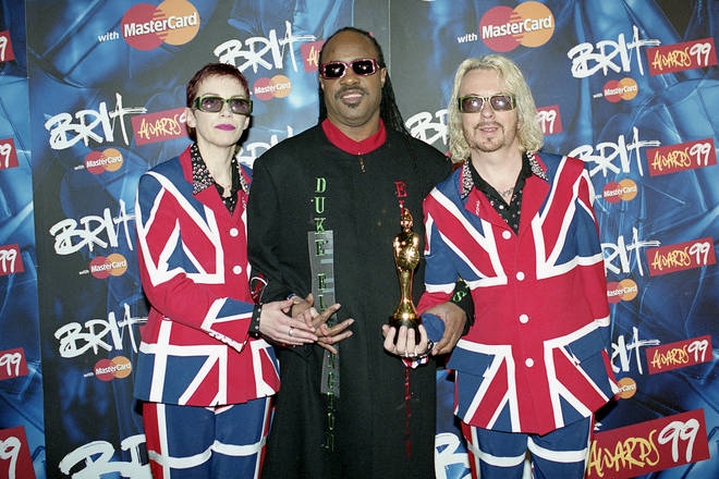 Stevie presented the Outstanding Contribution award to Music to Eurythmics' Annie Lennox and Dave Stewart. (Photo by JMEnternational/Getty Images)