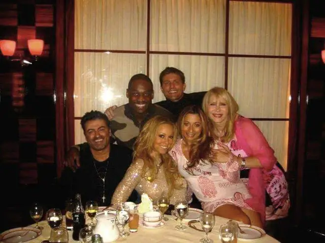 Mariah shared this picture of her and George having dinner together after he died.