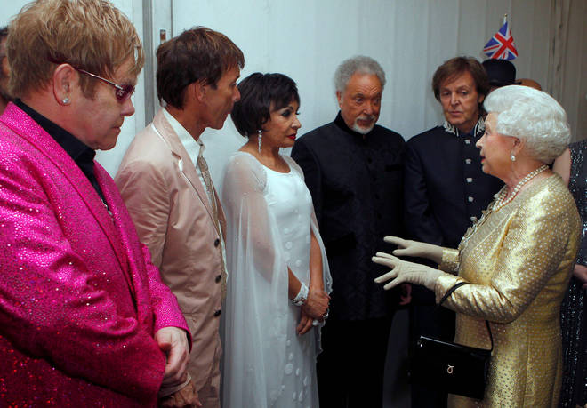 Her Majesty the Queen pictured with (L to R) Sir Elton John, Sir Cliff Richard, Dame Shirley Bassey, Sir Tom Jones and Sir Paul McCartney
