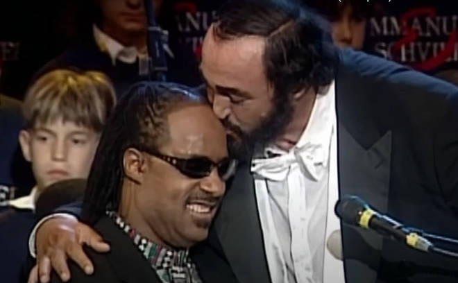 An awed Pavarotti kissed Stevie Wonder on the head and gave him a hug after their stunning performance together.