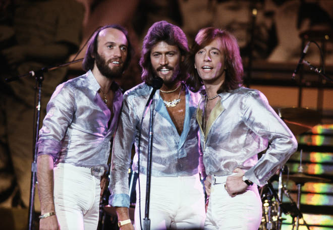 Dressed in matching silver outfits and donning chunky gold jewellery, the boys perfectly captured the look of the Gibb brothers. (Pictured, the Bee Gees in 1979)