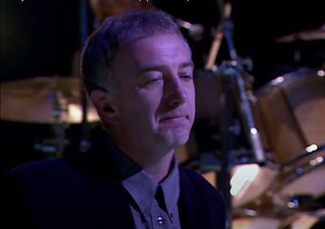 The clip shoes a 'desperately uncomfortable' John Deacon (pictured) during his last performance with Queen.