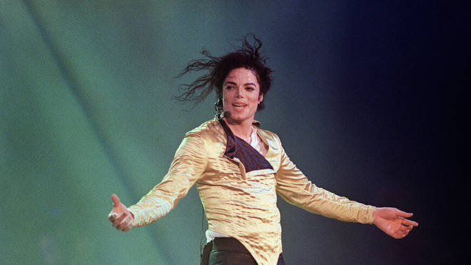 Michael Jackson at a concert in 1996