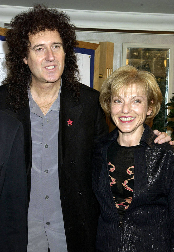 Mary Austin pictured with Queen's Brian May in 2002.