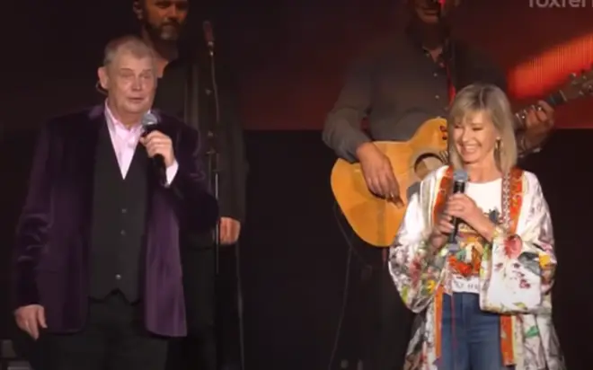 Taking to the stage with John Farnham, Olivia said to the crowd: "What an amazing night. I’m so proud to be a part of this," she said before turning to John and adding: "...and singing with you again."