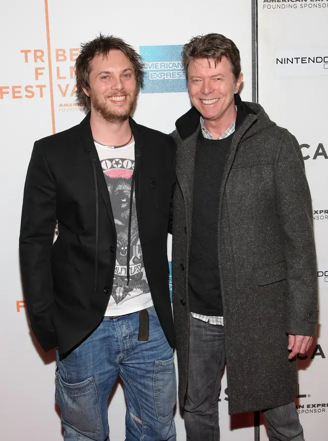 Duncan Jones with her father at the premiere of his debut film Moon in 2009. (Photo by Michael Loccisano/Getty Images for Tribeca Film Festival)