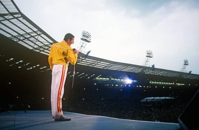 Freddie Mercury pictured performing with Queen at Wembley stadium on July 11, 1986