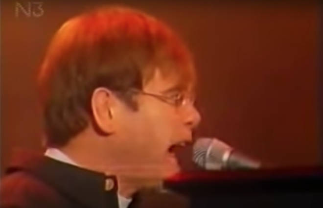 At one point Elton turns and shouts at someone behind him, going back to the microphone with less than a second to spare as he sings the next verse of 'The B*tch Is Back'.