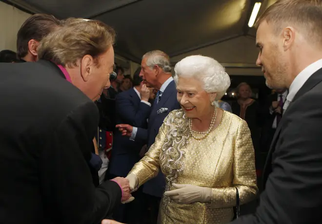 But not only was the Queen witness to the rise of the biggest musicians of her generation, she also rubbed shoulders with many and even honoured a good number of them. Pictured with Sir Andrew Lloyd-Webber and Gary Barlow.