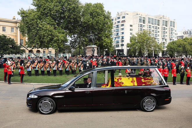 The State Hearse carrying the coffin leaves Wellington Arch