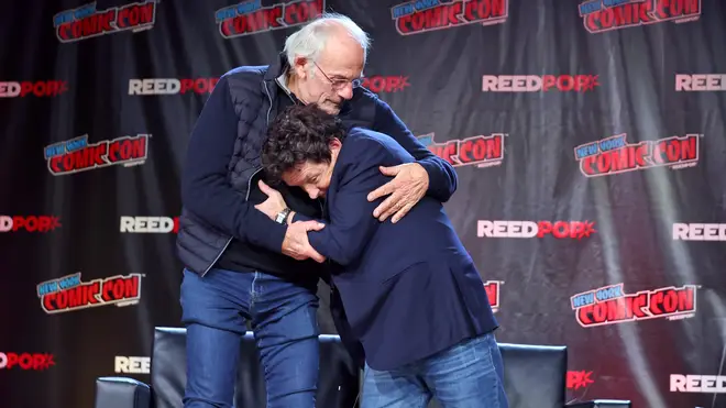 Christopher Lloyd and Michael J Fox embrace at New York Comic Con