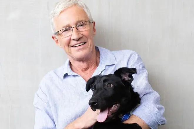 Paul O'Grady collie cross Benson during filming for his ITV show