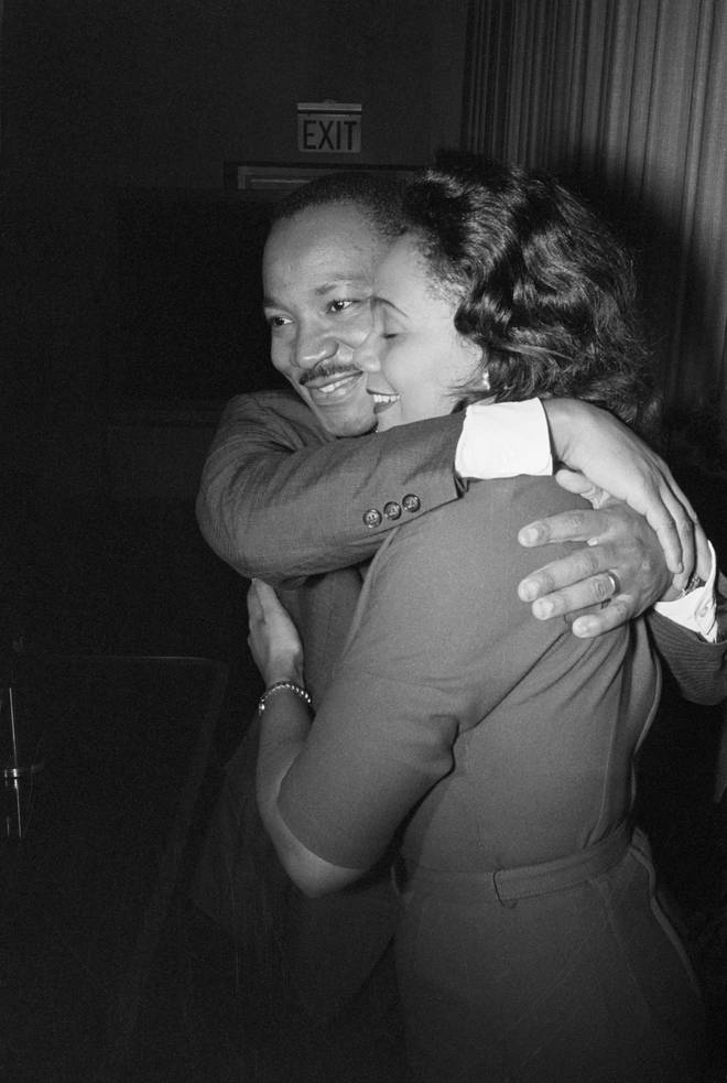 Dr. Martin Luther King, Jr. hugs his wife Coretta