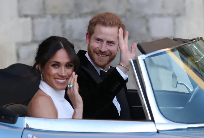 Harry and Meghan on the way to their wedding reception