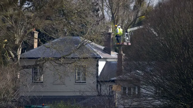 Builders working on the chimney's of Frogmore Cottage