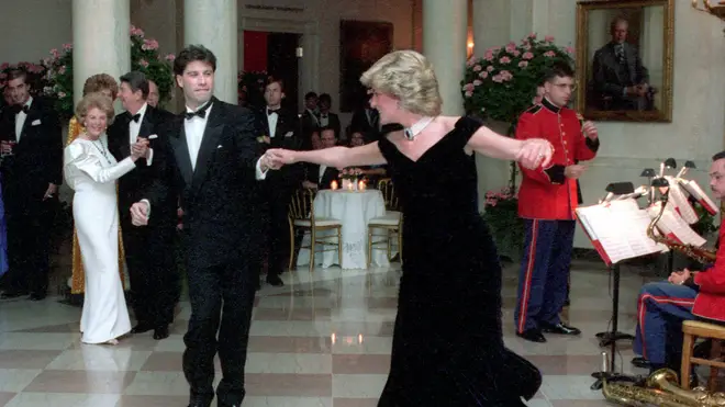 John Travolta and Princess Diana dance together at the White House in 1985