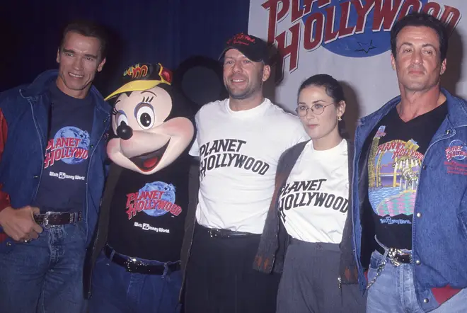 Arnold Schwarzenegger, Bruce Willis, Demi Moore and Sylvester Stallone together at Planet Hollywood in Orlando, Florida in 1994. (Photo by Ron Galella, Ltd./Ron Galella Collection via Getty Images)