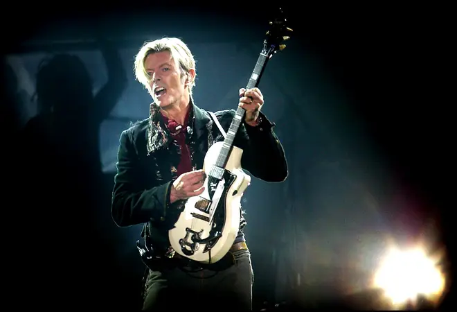 Rock legend David Bowie performs on stage
