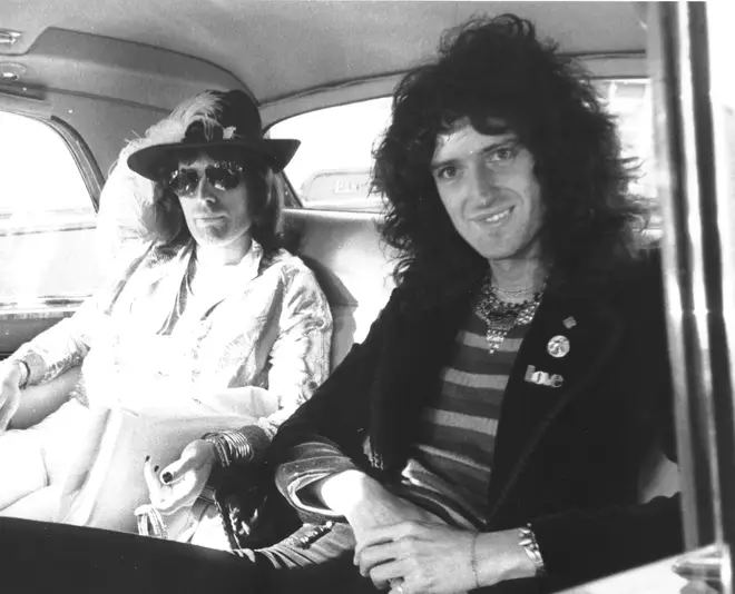 Freddie Mercury and Brian May in the back of a car, 1974