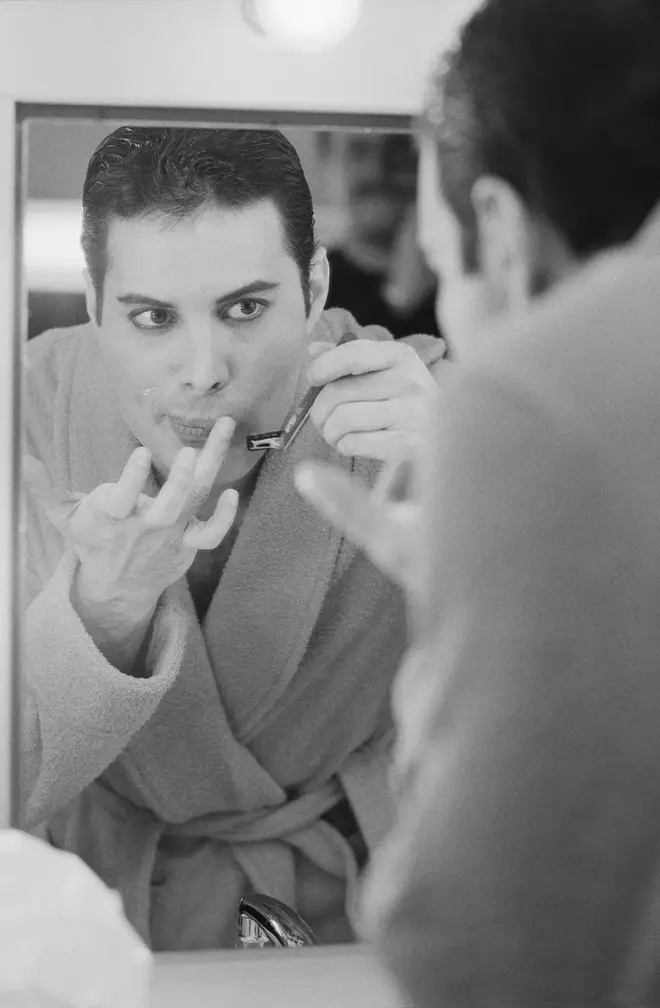 Th Queen frontman shaving his moustache backstage on April 12, 1984