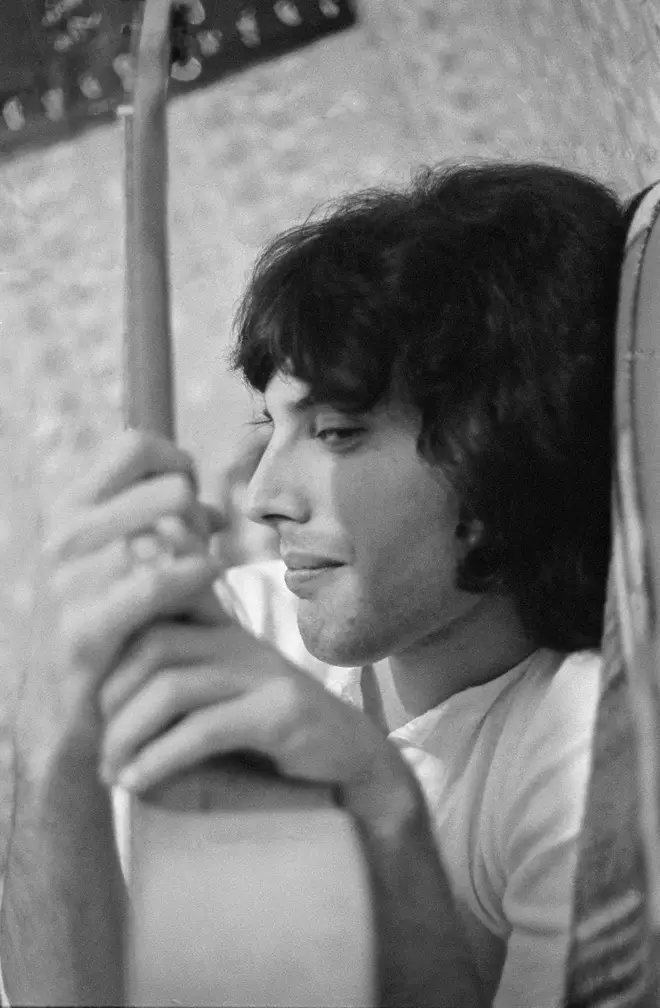 Freddie Mercury pictured relaxing at his Shepherd's Bush, London flat in 1969