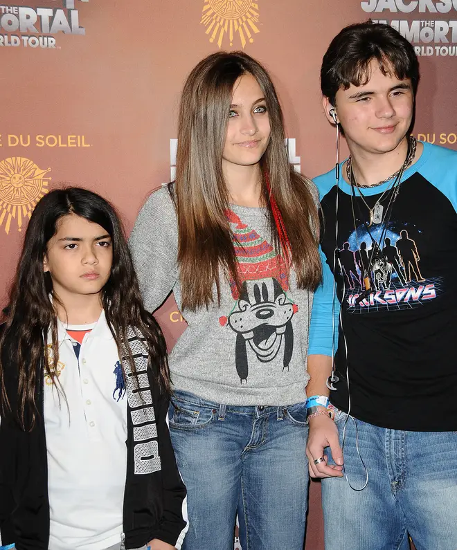 Blanket Jackson, Paris Jackson and Prince Michael Jackson attend the Los Angeles opening of "Michael Jackson THE IMMORTAL World Tour" on January 27, 2012 in Los Angeles, California