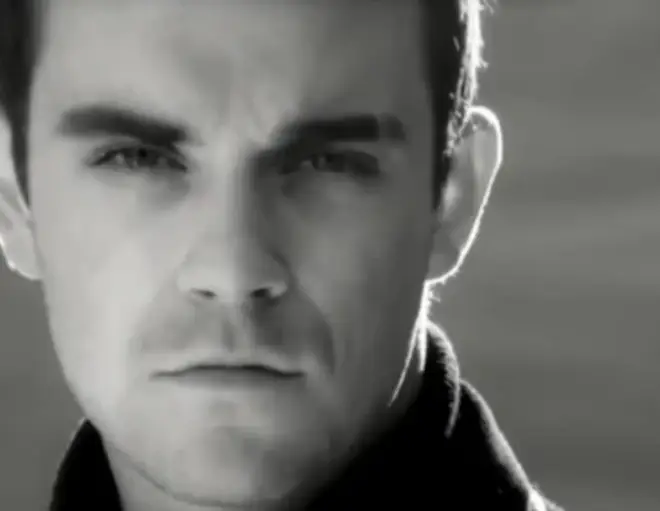 Robbie Williams has revealed his hit song 'Angels' was written about supernatural encounters