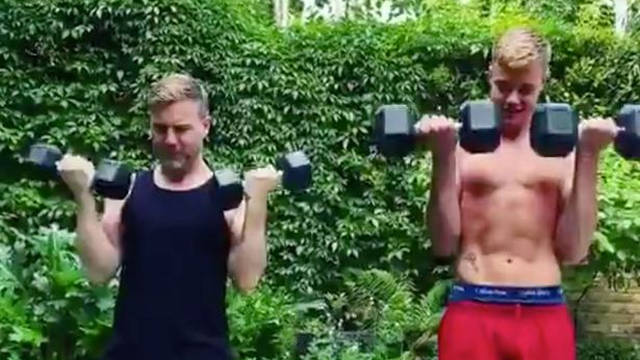 Gary Barlow works out with son Daniel