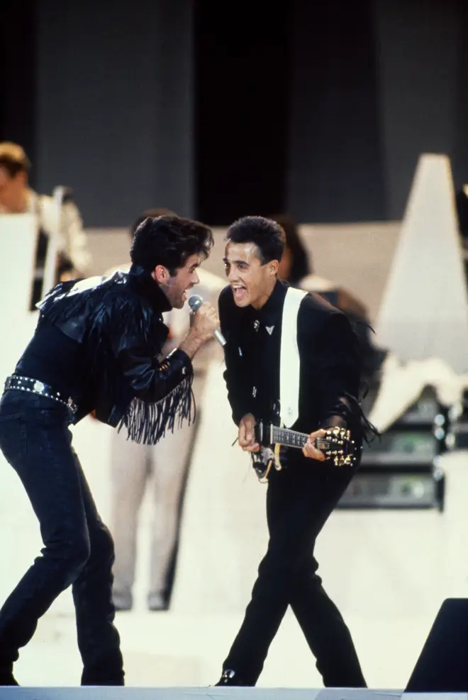 George Michael and Andrew Ridgeley of pop duo WHAM! performing their farewell concert at Wembley Stadium, London, 28th June 1986.