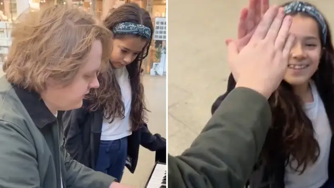 Lewis Capaldi teaching a girl piano at Kings Cross