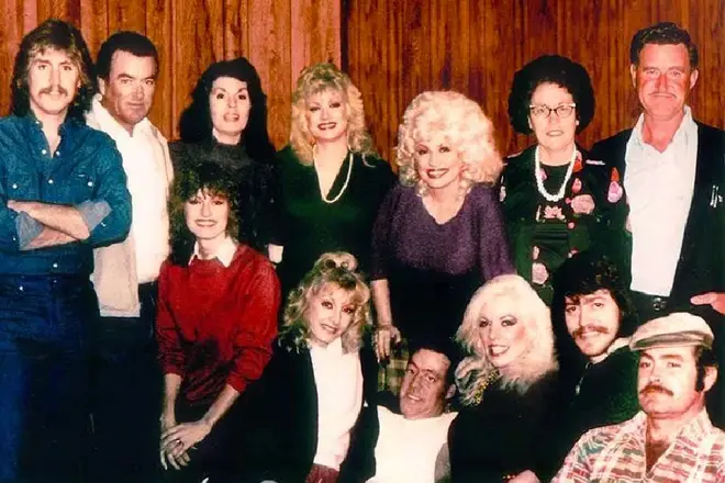 Dolly and her siblings with their parents.