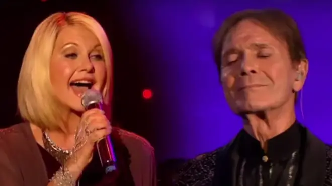 Cliff Richard gave a moving speech about the last months of his friendship with Olivia, before launching into an incredible reenacted duet between the pair.