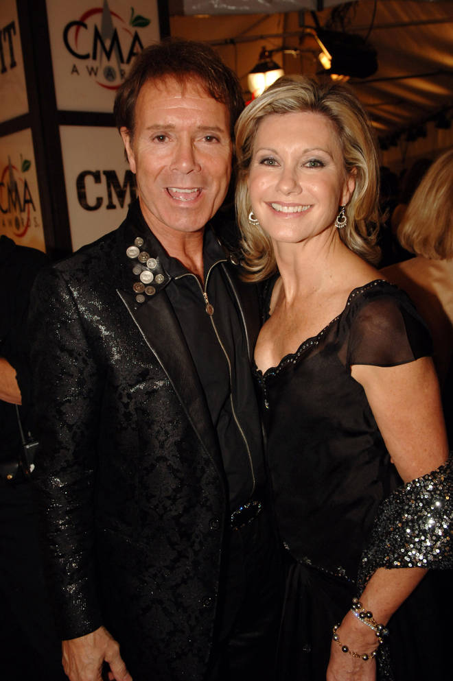 In a short introduction before his performance, Sir Cliff gave an insight into Olivia Newton-John&squot;s last days before her death, adding that despite knowing she was sick, her death still came "as a shock" (the pair pictured in 2004)