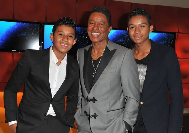 Jaafar (right) with brother Jermajesty and father Jermaine in 2013