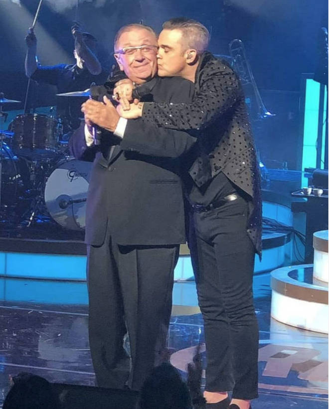Robbie Williams would often invite his father on stage to sing with him.