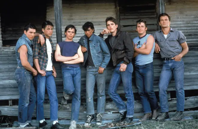 Tom Cruise (far left) in The Outsiders alongside Patrick Swayze and Matt Dillon.