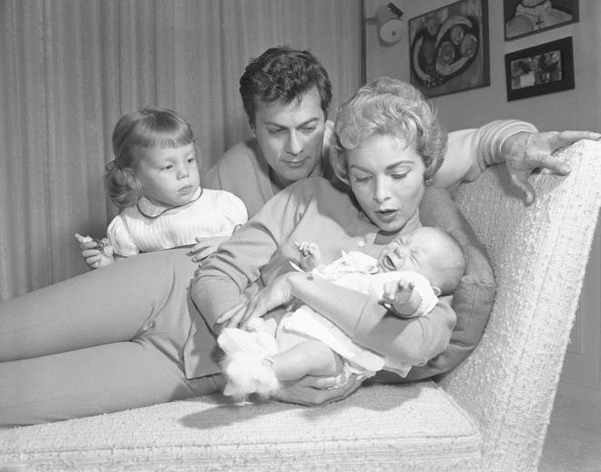 Tony Curtis and Janet Leigh with their daughters Jamie Lee and Kelly at home in Hollywood.