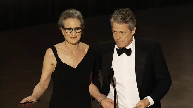 Andie MacDowell and Hugh Grant at the 2023 Oscars