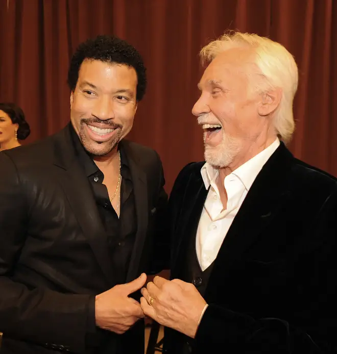 Lionel Richie and Kenny Rogers remained lifelong friends after first working together. (Photo by Rick Diamond/Getty Images)
