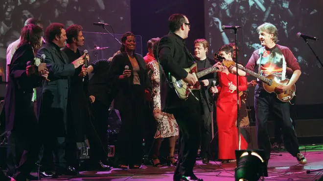 Chrissie Hynde, Tom Jones, George Michael, Des'ree, Elvis Costello, Eddie Izzard, and Sinead O'Connor joined Paul McCartney on stage. (Photo by Dave Hogan/Getty Images)