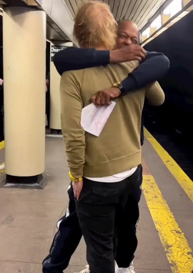 Jung is then overcome as he hugs Sheeran and the pair then give an impromptu duet of the song as they stand on the subway station platform.