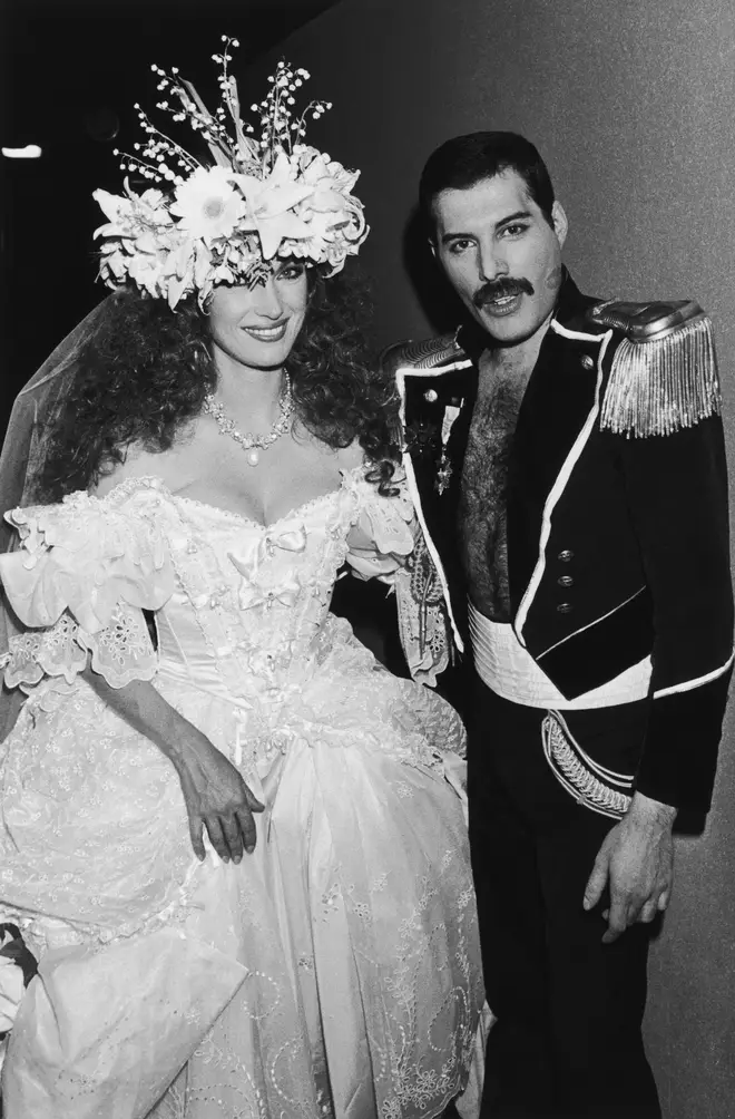 Freddie Mercury pictured wearing the jacket alongside Jane Seymour in 1985.
