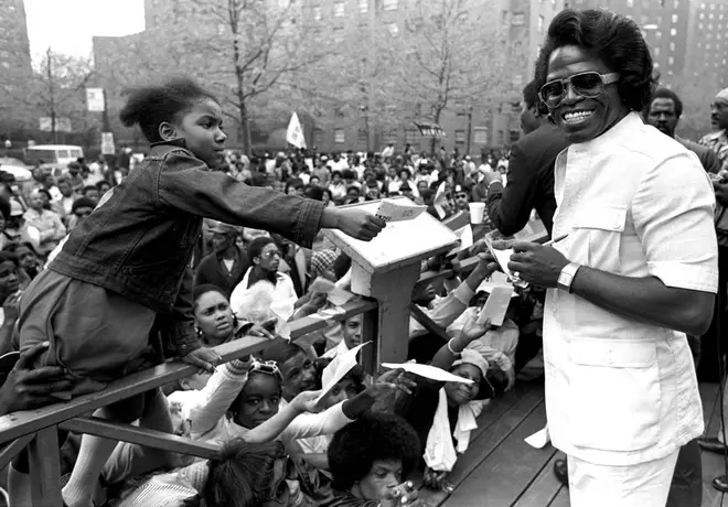 James Brown posing for autographs with fans. (Photo by Richard E. Aaron/Redferns)
