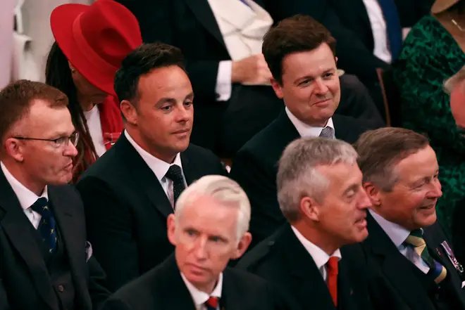 British television presenting duo Ant and Dec sit as guests wait during the Coronation of King Charles III and Queen Camilla